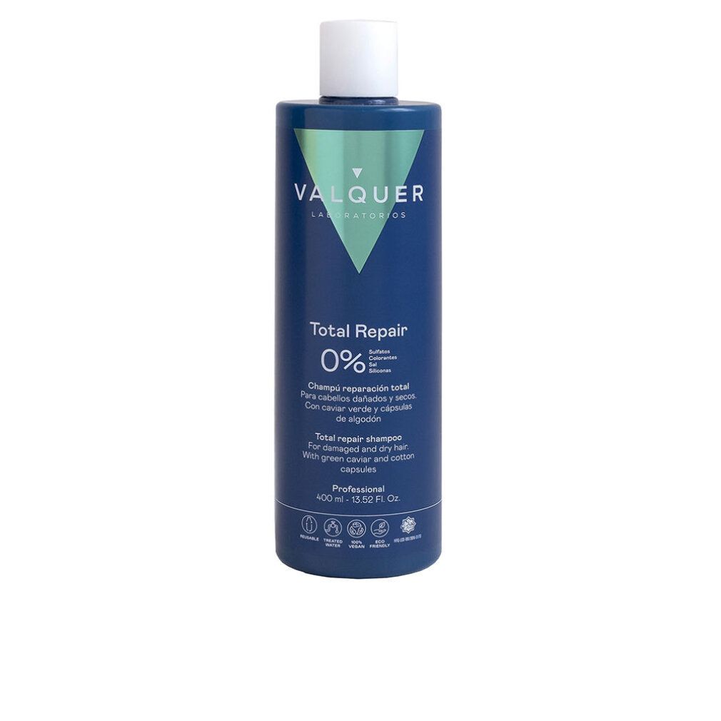 Flacone di shampoo blu con tappo bianco. Scritta: Total Repair 0%. Logo e testo.