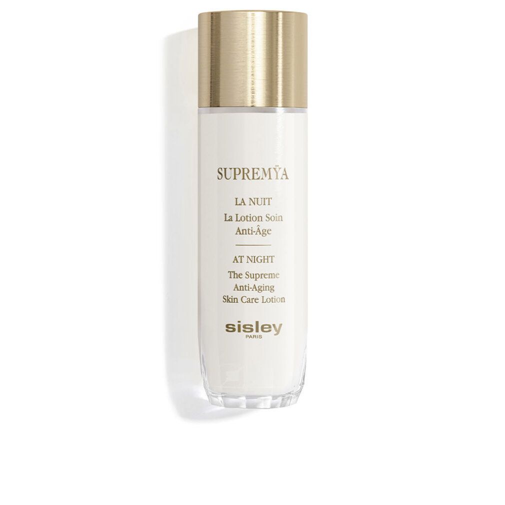 Flacone bianco con tappo dorato. Scritte: Supremya, La Nuit, Anti-Age, Sisley Paris. Base trasparente.
