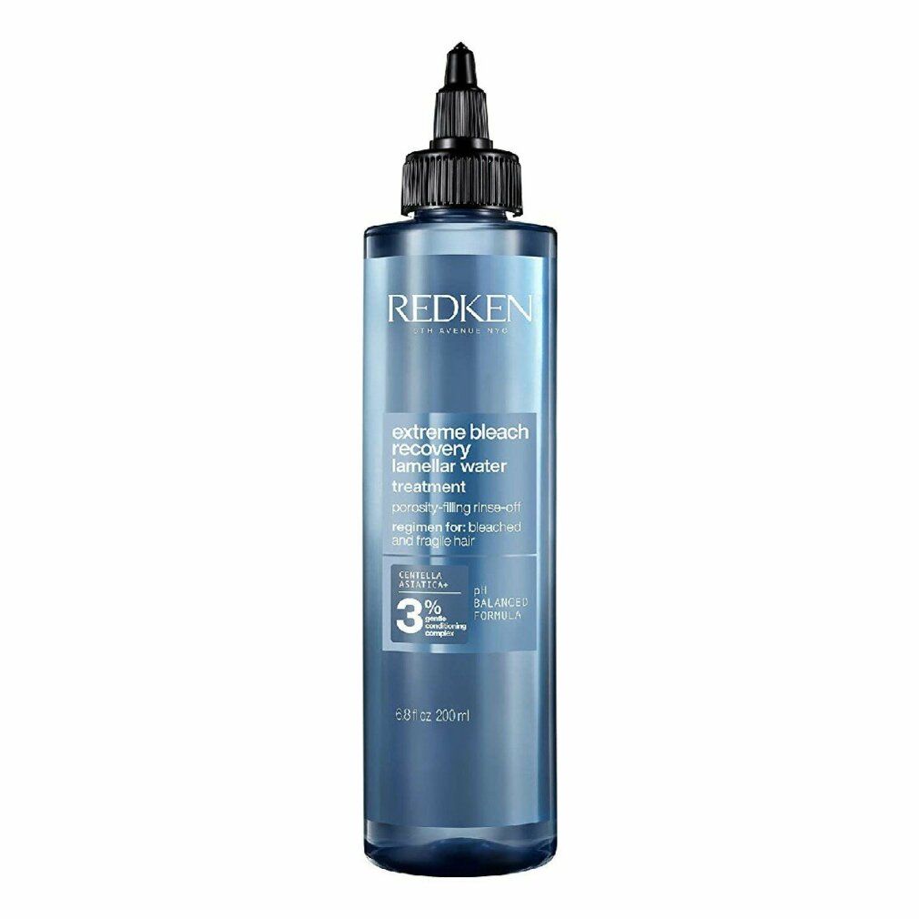 Flacone blu con tappo nero. Scritta: REDKEN, extreme bleach recovery, trattamento lamellare. Contiene il 3% di complesso curativo.