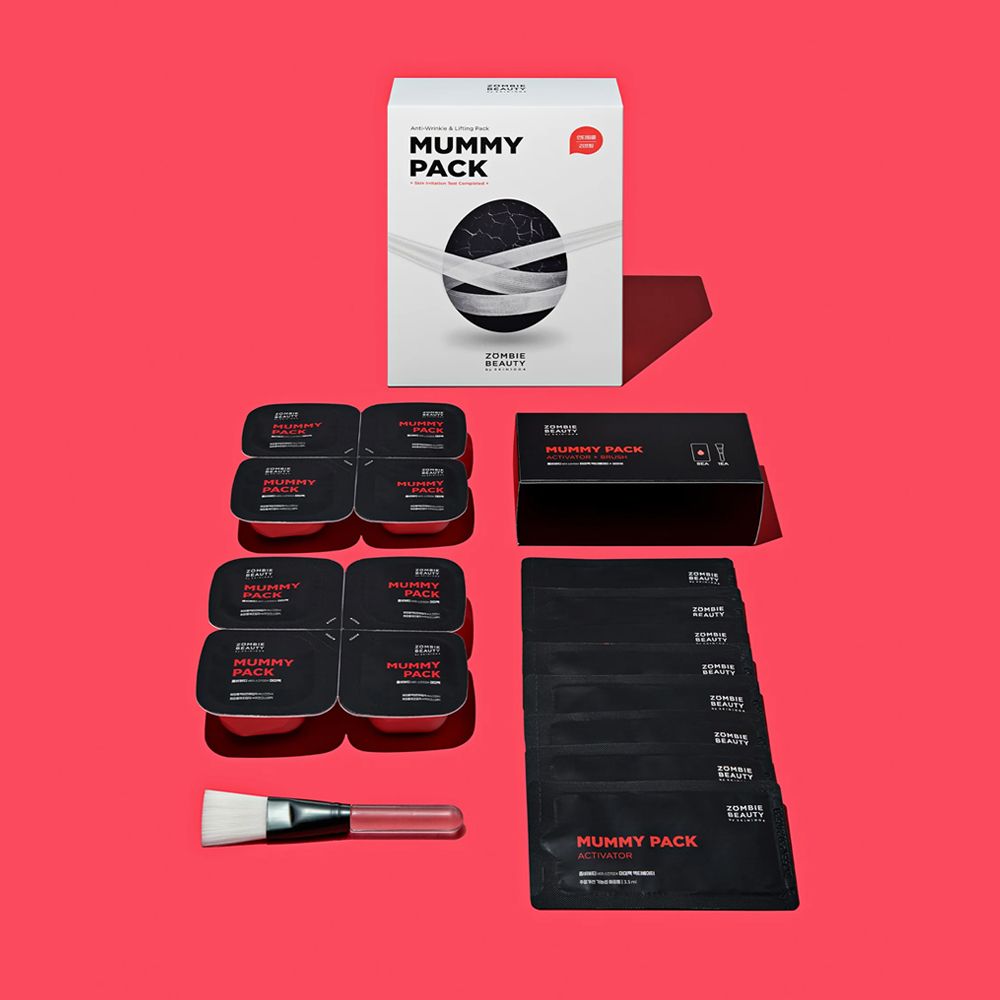 Confezione prodotto con più confezioni singole, pennello e scatola nera. Scritta: MUMMY PACK.