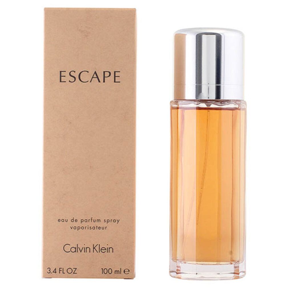 Flacone di profumo e confezione. Scritta: ESCAPE, Calvin Klein. Flacone con tappo argentato, liquido dorato. 3.4 FL OZ, 100 ml.