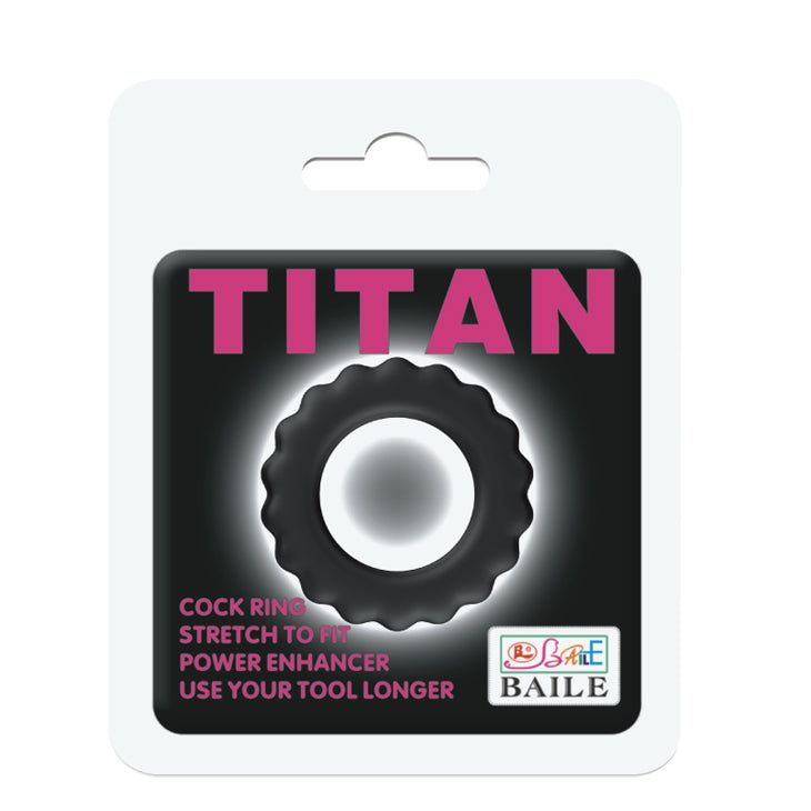 Confezione con anello nero. Testo: TITAN, COCK RING, STRETCH TO FIT, POWER ENHANCER, USE YOUR TOOL LONGER.