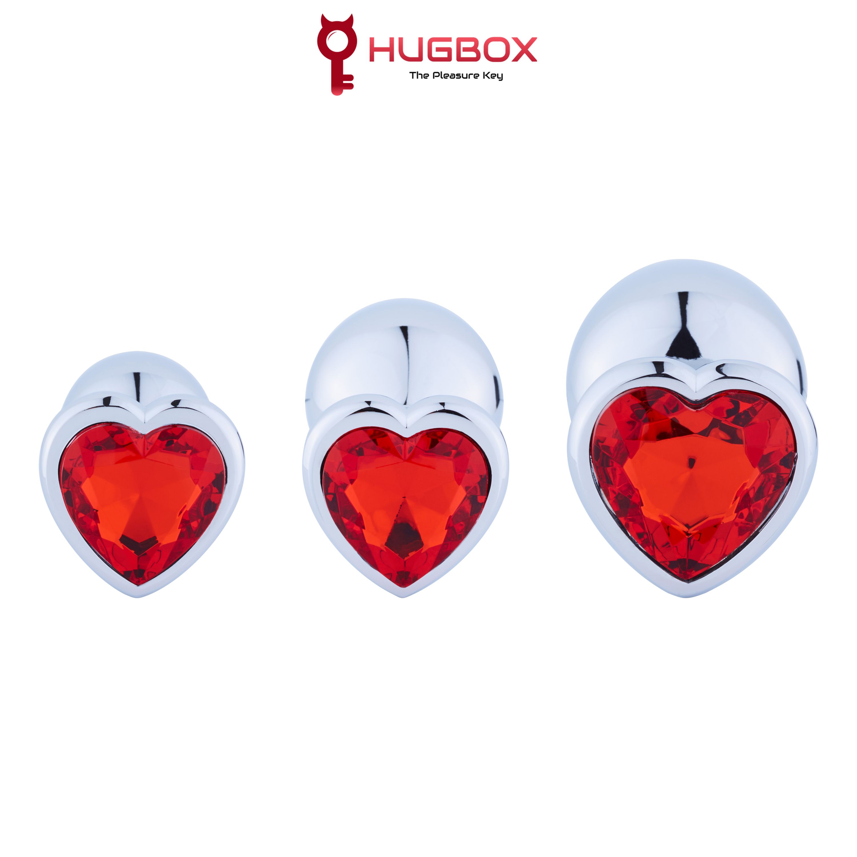 Tre plug anali con cristalli rossi a forma di cuore. Diverse dimensioni, lucido.