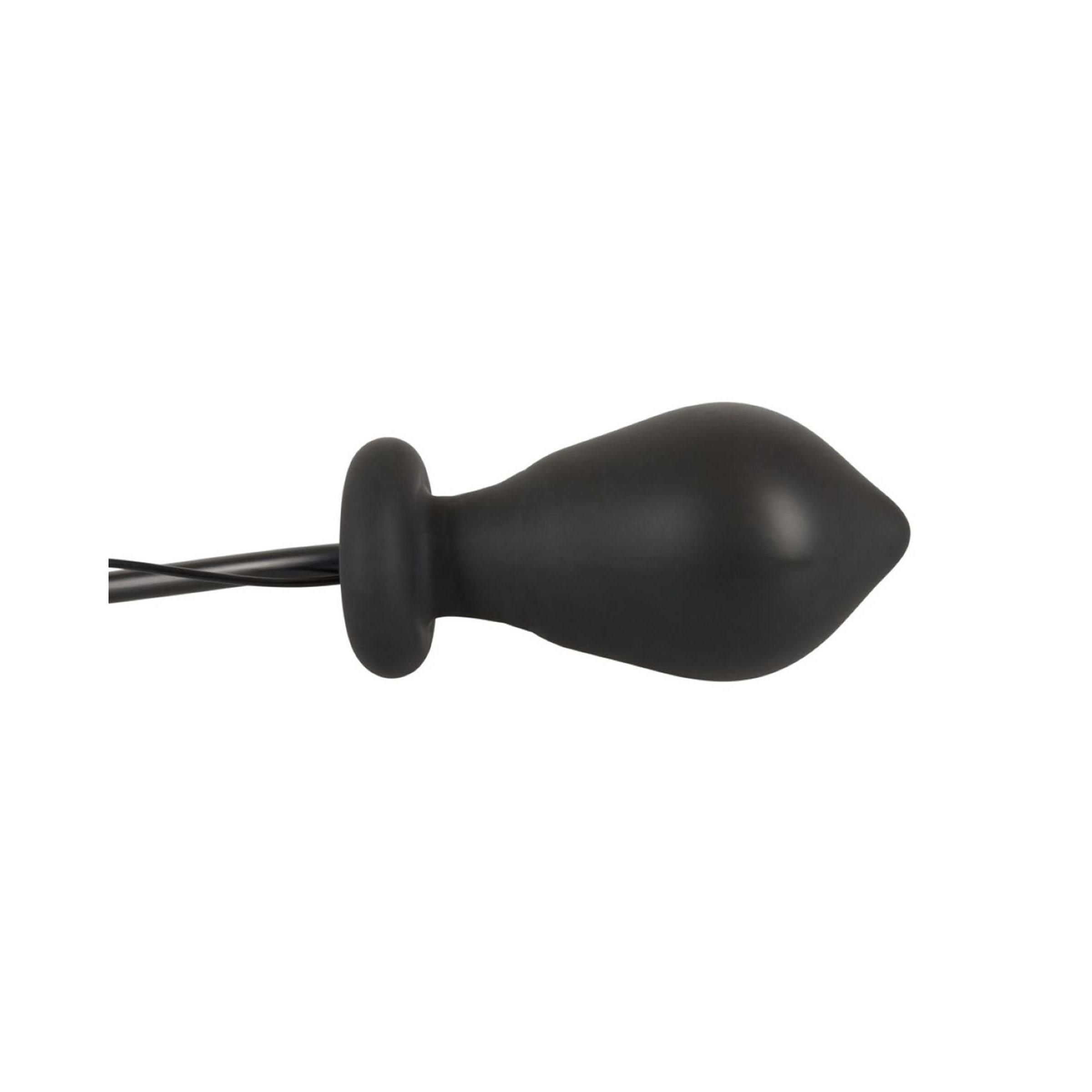 Plug anale nero in silicone, a forma di cono, con base arrotondata.
