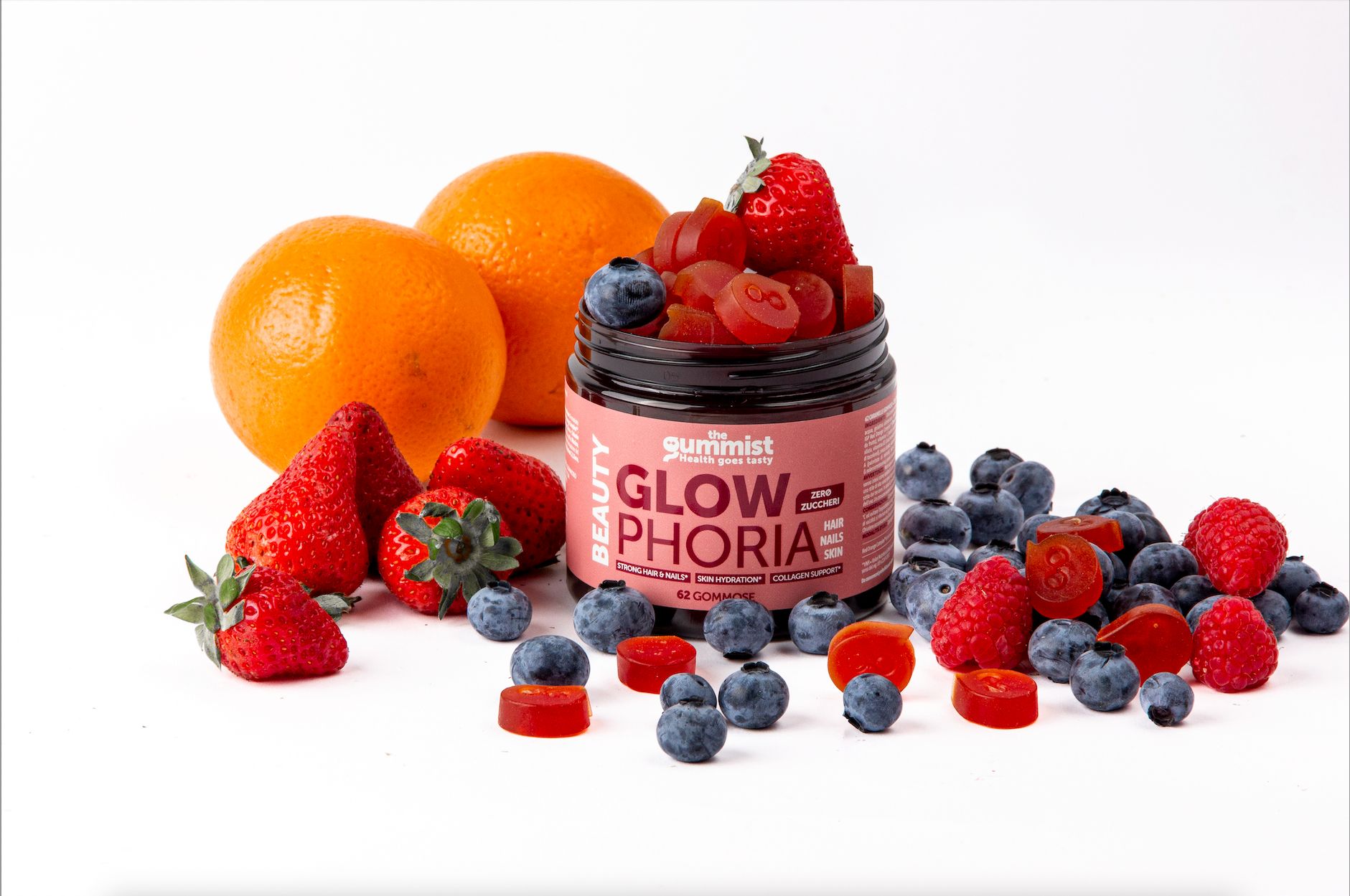 Barattolo di caramelle gommose, frutta. Mirtilli, fragole e arance. Scritta: Glowphoria.