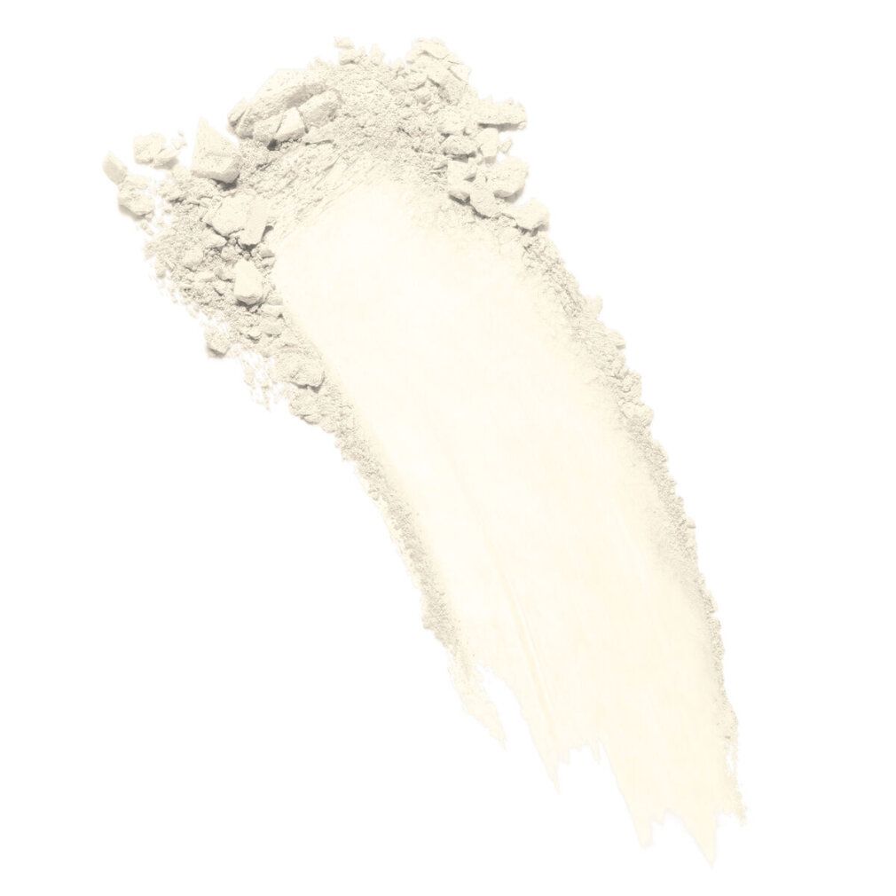 Traccia obliqua di polvere chiara su sfondo bianco. La texture è visibile.