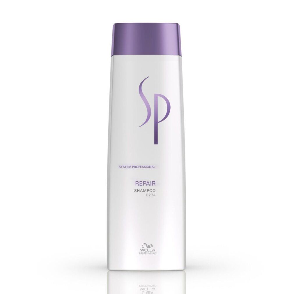 Flacone di shampoo bianco e viola. Scritta SP, Repair Shampoo, Wella. Flacone in posizione verticale.