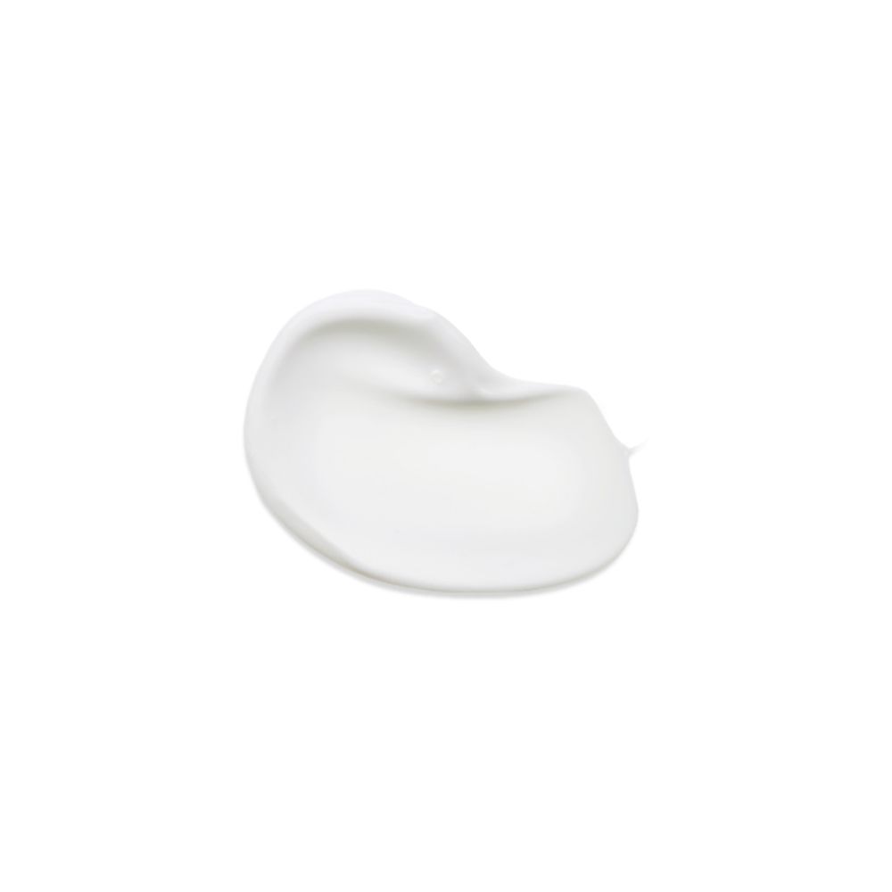 Macchia di crema bianca. Texture della crema. Su sfondo bianco.