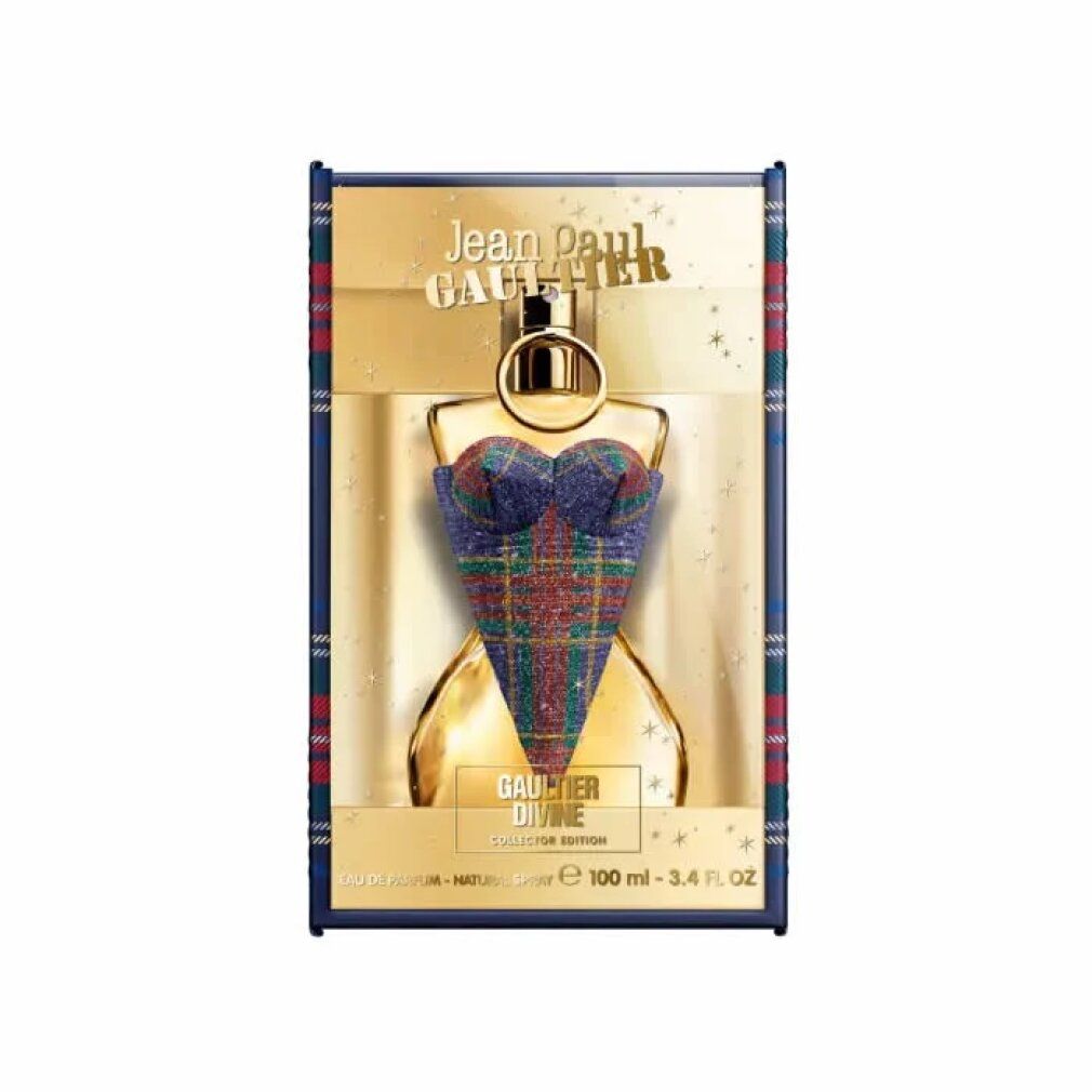 Flacone di profumo in confezione regalo. Flacone a forma di corsetto con motivo tartan blu-verde. Dettagli dorati. Marchio e nome del prodotto visibili.