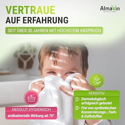 Bambino che tiene un asciugamano bianco davanti al viso, accanto pubblicità AlmaWin per l'igiene.