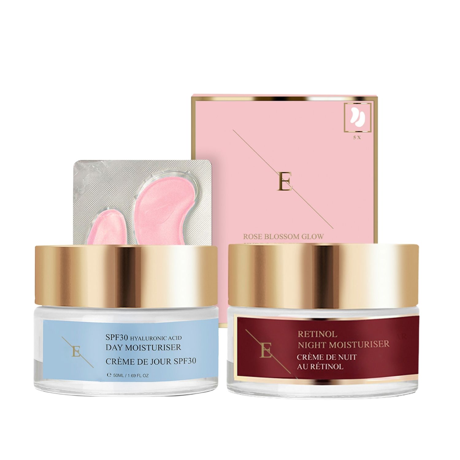 Due vasetti e una scatola. Scritte: SPF30, Retinolo, Crème de Jour, Crème de Nuit. Coperchi dorati, confezione rosa, patch occhi.