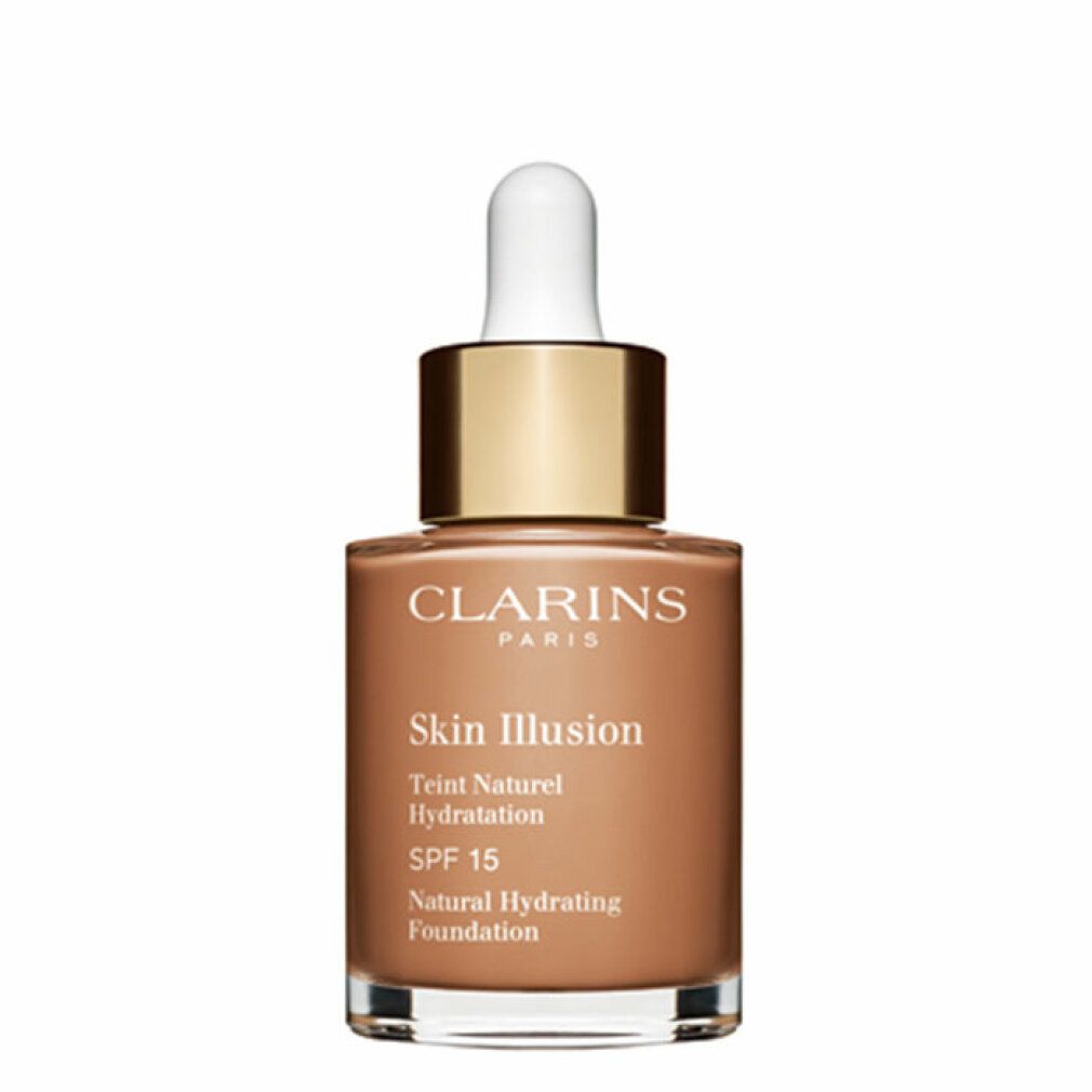 Fondotinta Clarins Skin Illusion. Liquido marrone in flacone di vetro con tappo dorato e pipetta. SPF 15.