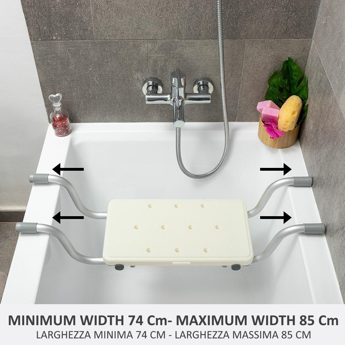 Sedile vasca in vasca. Larghezza 74-85cm. Seduta forata, maniglie grigie. Frecce indicano la larghezza.