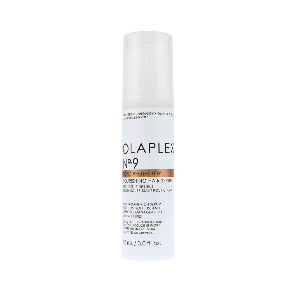Flacone bianco Olaplex No.9 Bond Protector con pompa. Scritta: Nourishing Hair Serum. Striscia marrone con nome del prodotto.