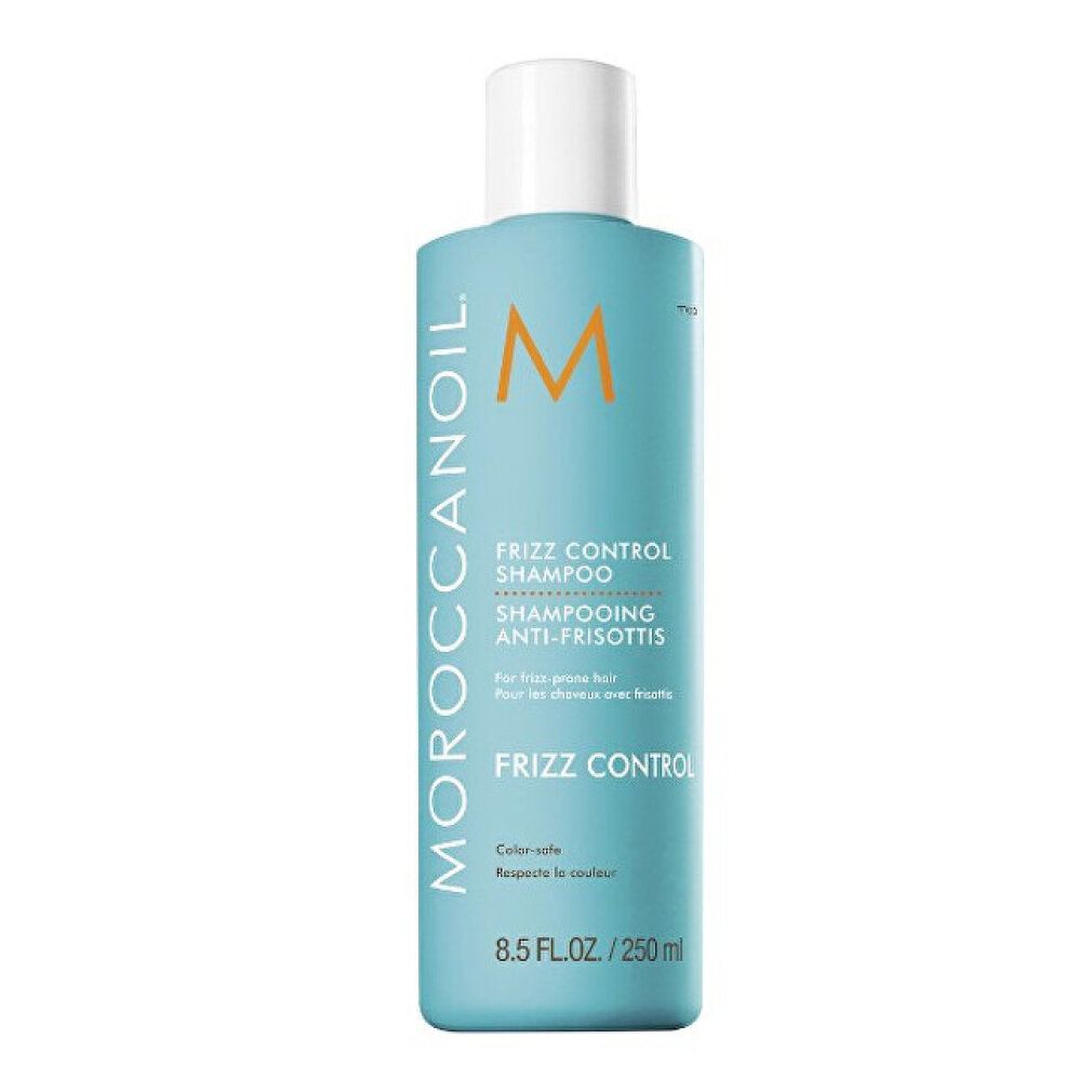 Flacone di shampoo turchese con tappo bianco. Scritta: Moroccanoil, Frizz Control Shampoo. 8.5 FL.OZ./250 ml.