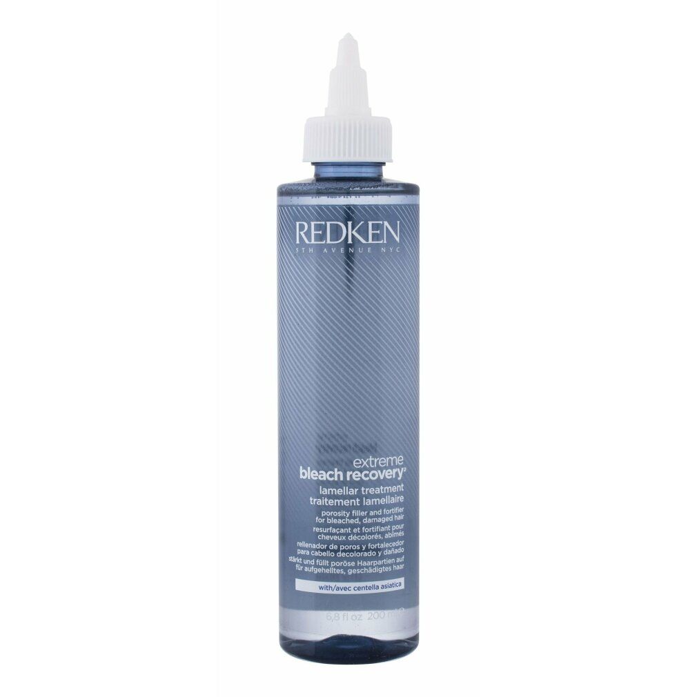 Flacone blu con tappo bianco. Scritta: REDKEN, extreme bleach recovery, trattamento lamellare. Testo multilingue.