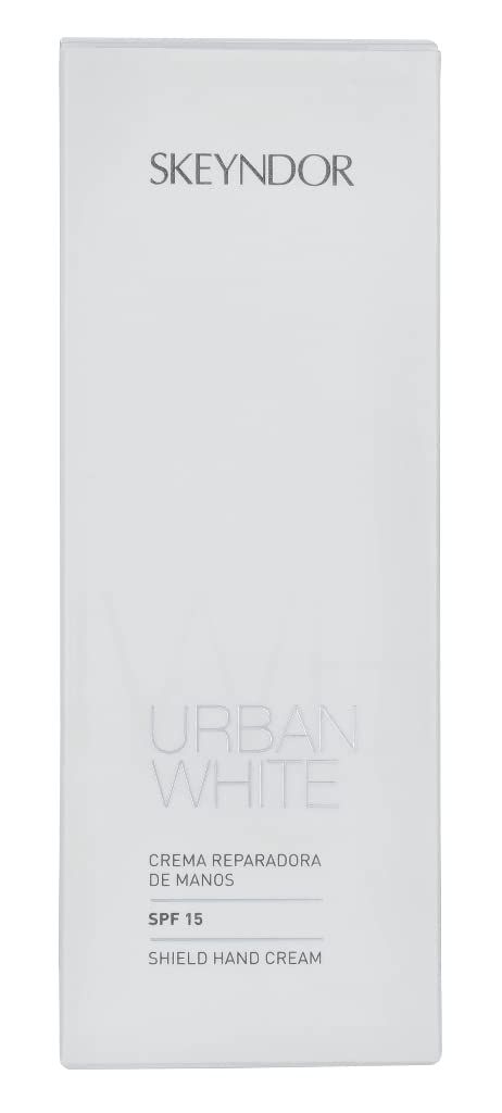 Scatola bianca Skeyndor. Testo: Urban White, Crema Reparadora de Manos, SPF 15, Shield Hand Cream. Forma rettangolare.