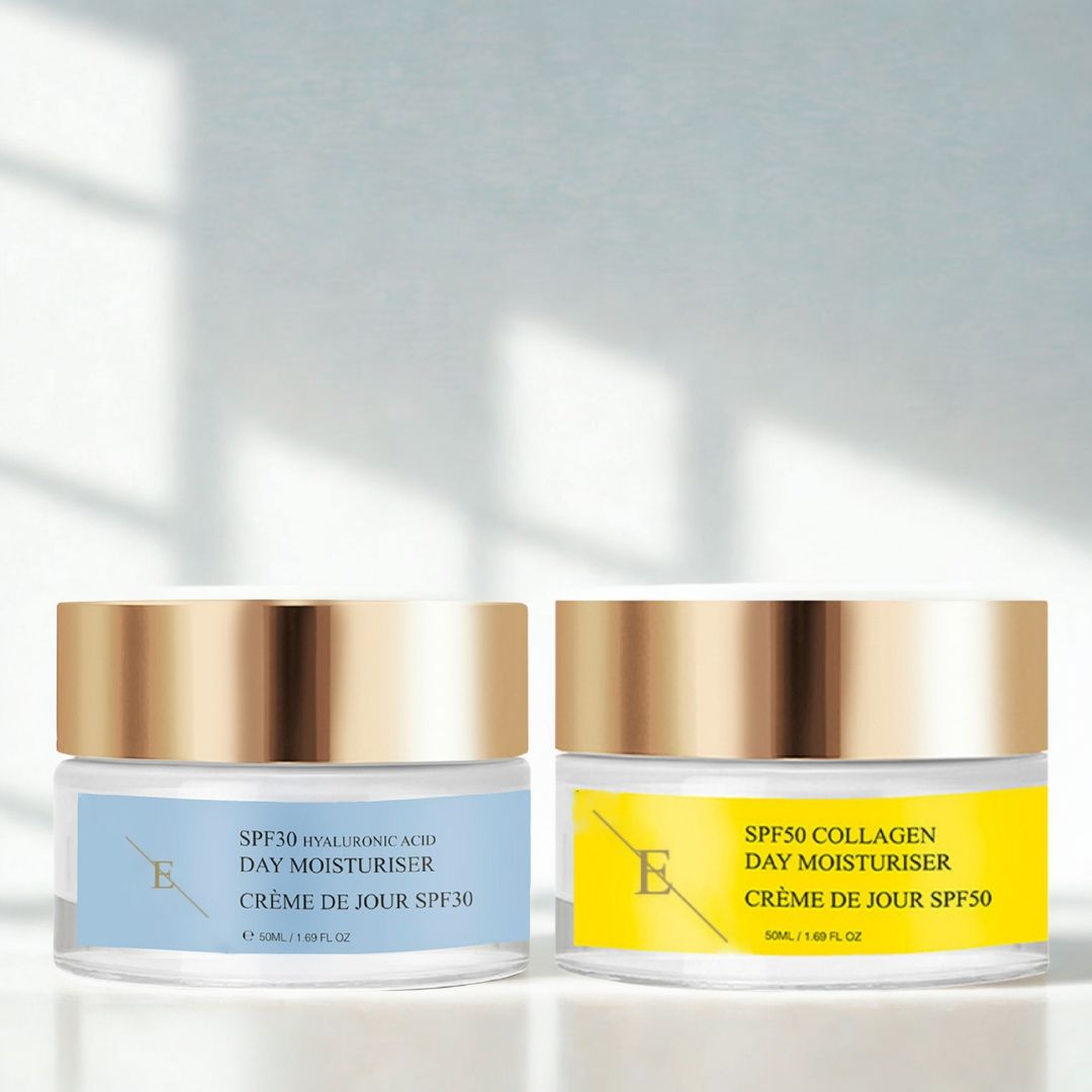 Due creme con coperchi dorati ed etichette. "SPF30" e "SPF50". Le creme sono affiancate.