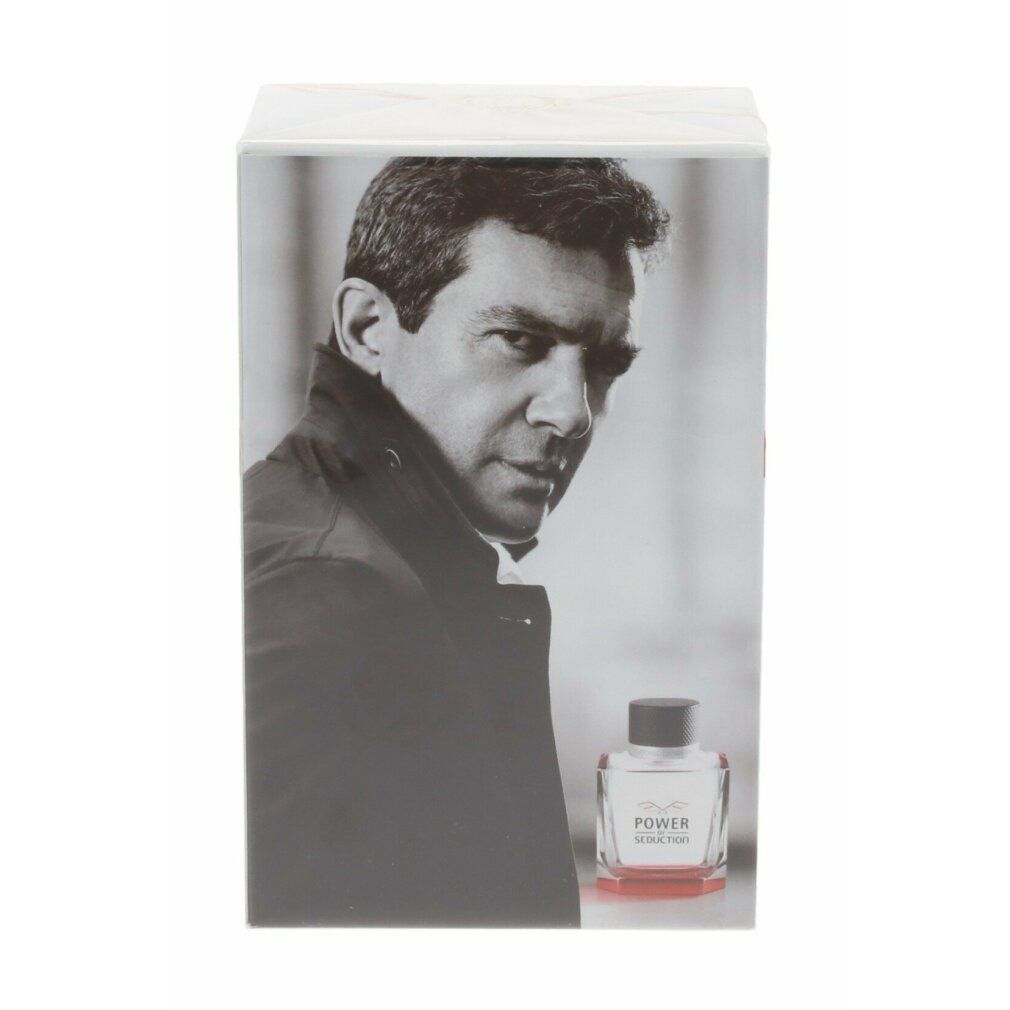 Confezione con un ritratto in bianco e nero di Antonio Banderas. È raffigurata una bottiglia.