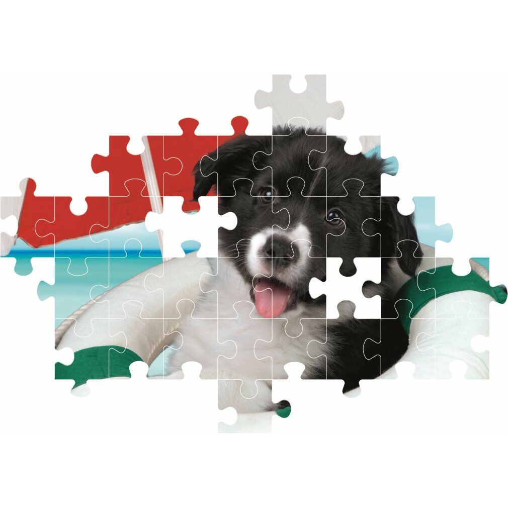 Puzzle parzialmente assemblato con un cane in un salvagente. I pezzi mostrano l'immagine.