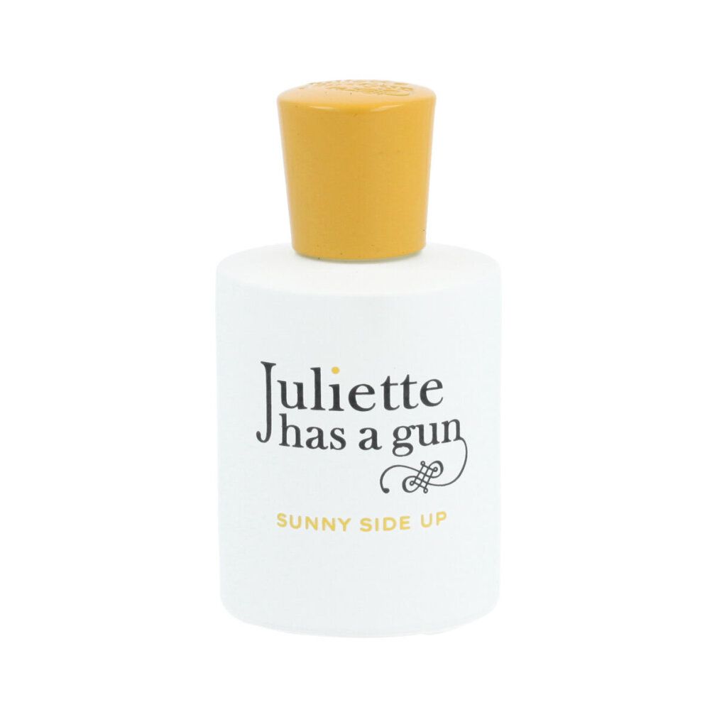 Flacone bianco con tappo giallo. Scritta: Juliette has a gun, Sunny Side Up.