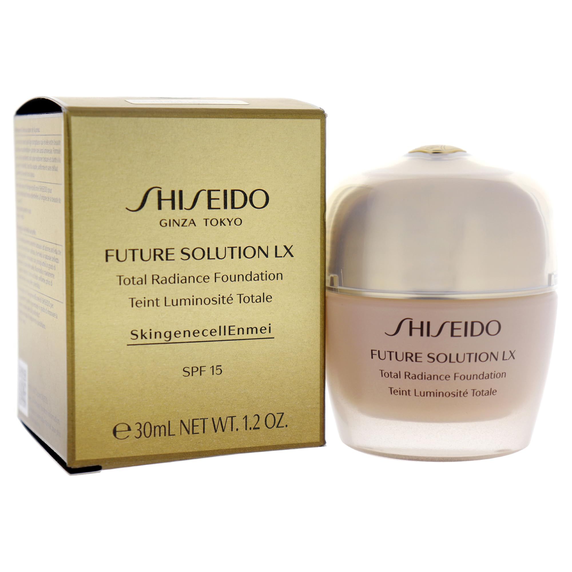 Flacone di fondotinta e scatola dorata. Scritta Shiseido, Future Solution LX, Total Radiance Foundation, SPF 15.