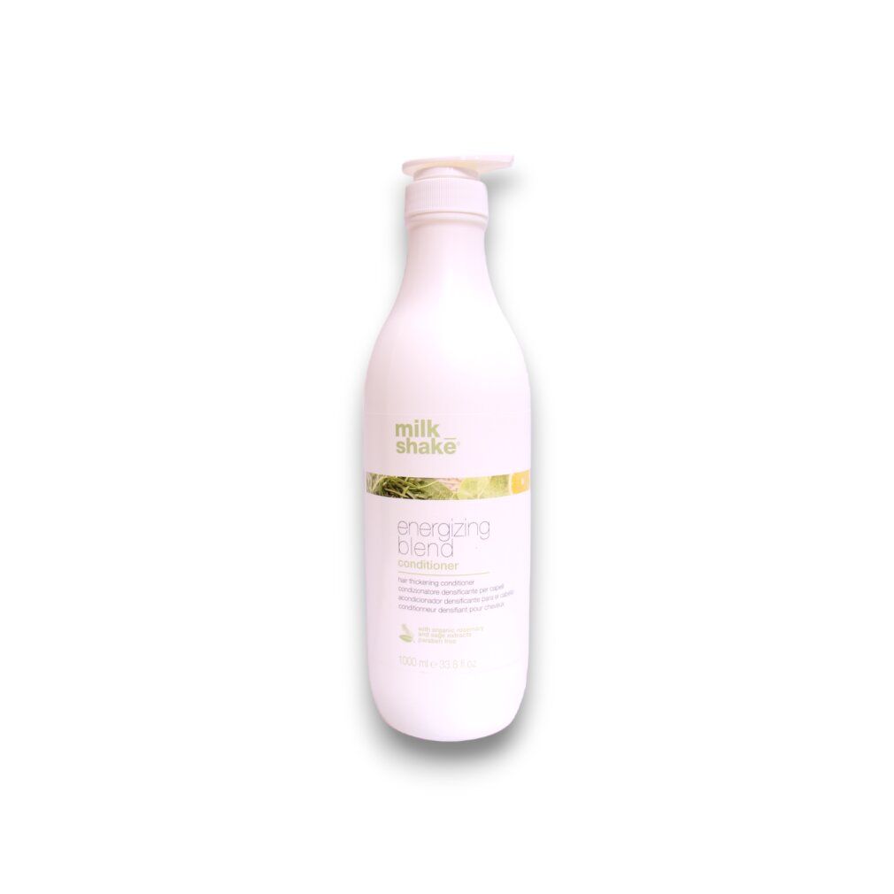 Flacone bianco con pompa, etichetta "milk shake" e "energizing blend conditioner".