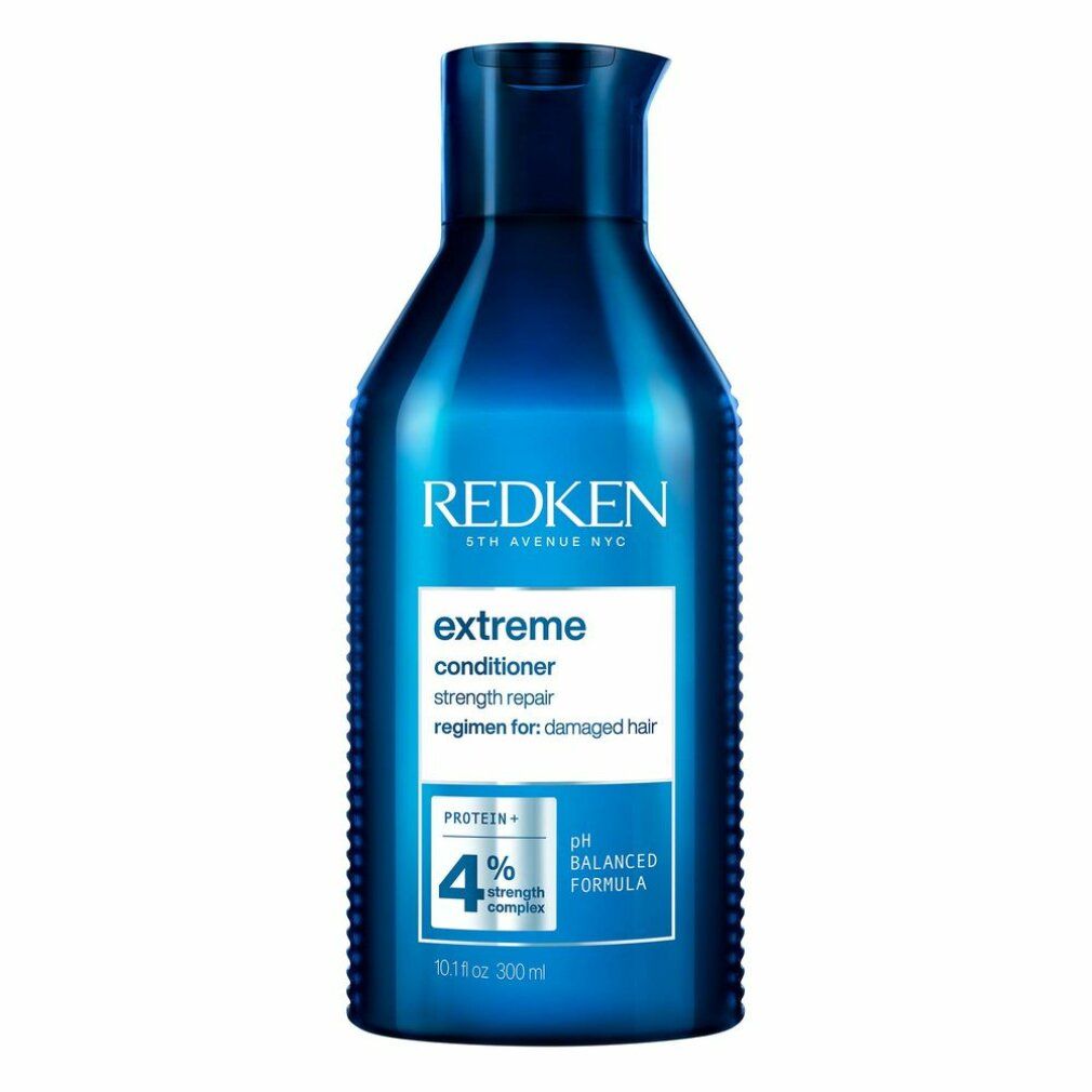 Flacone blu scuro di Redken Extreme Conditioner. Contiene 300 ml. Scritta: Extreme, pH Balanced Formula, 4% Strength Complex.