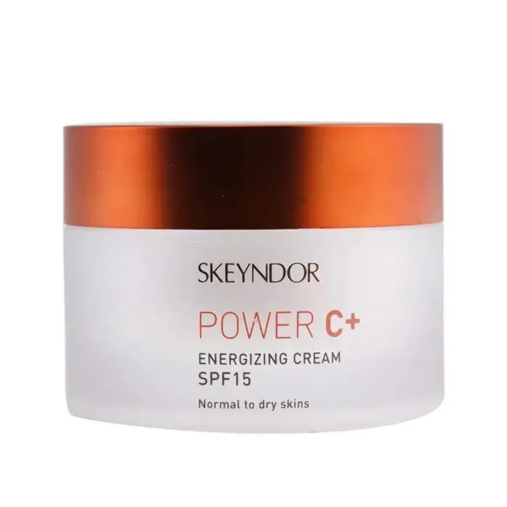 Vaso bianco con coperchio arancione. Scritta SKEYNDOR, POWER C+, Energizing Cream SPF15.