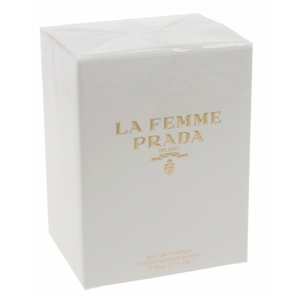 Confezione bianca con scritta dorata: LA FEMME PRADA MILANO. Forma quadrata. Non aperto.