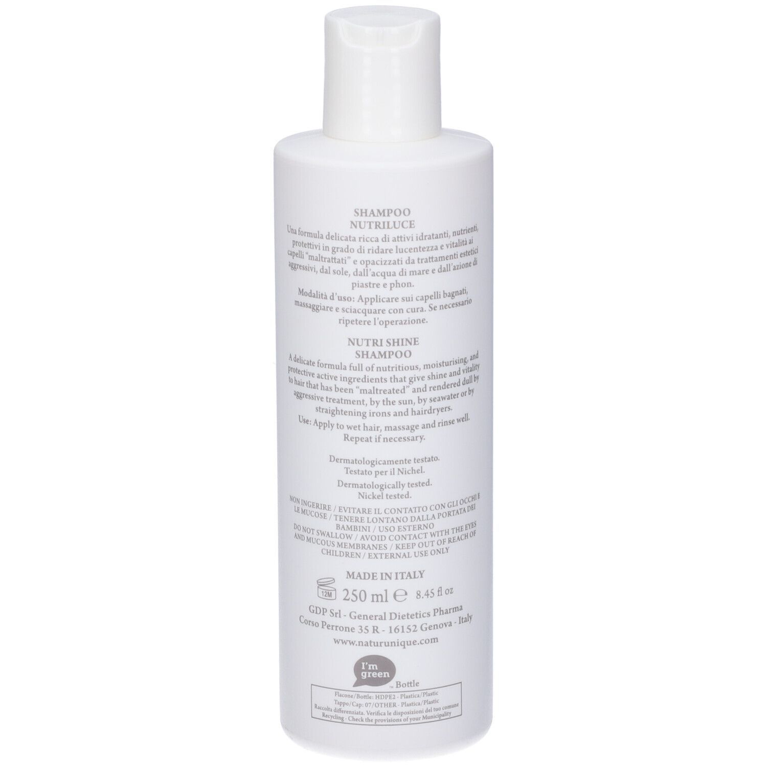Flacone bianco con testo. Scritta: Natur Unique, Aloe Attiva, Shampoo Nutriluce. Per capelli secchi. Testo in italiano.