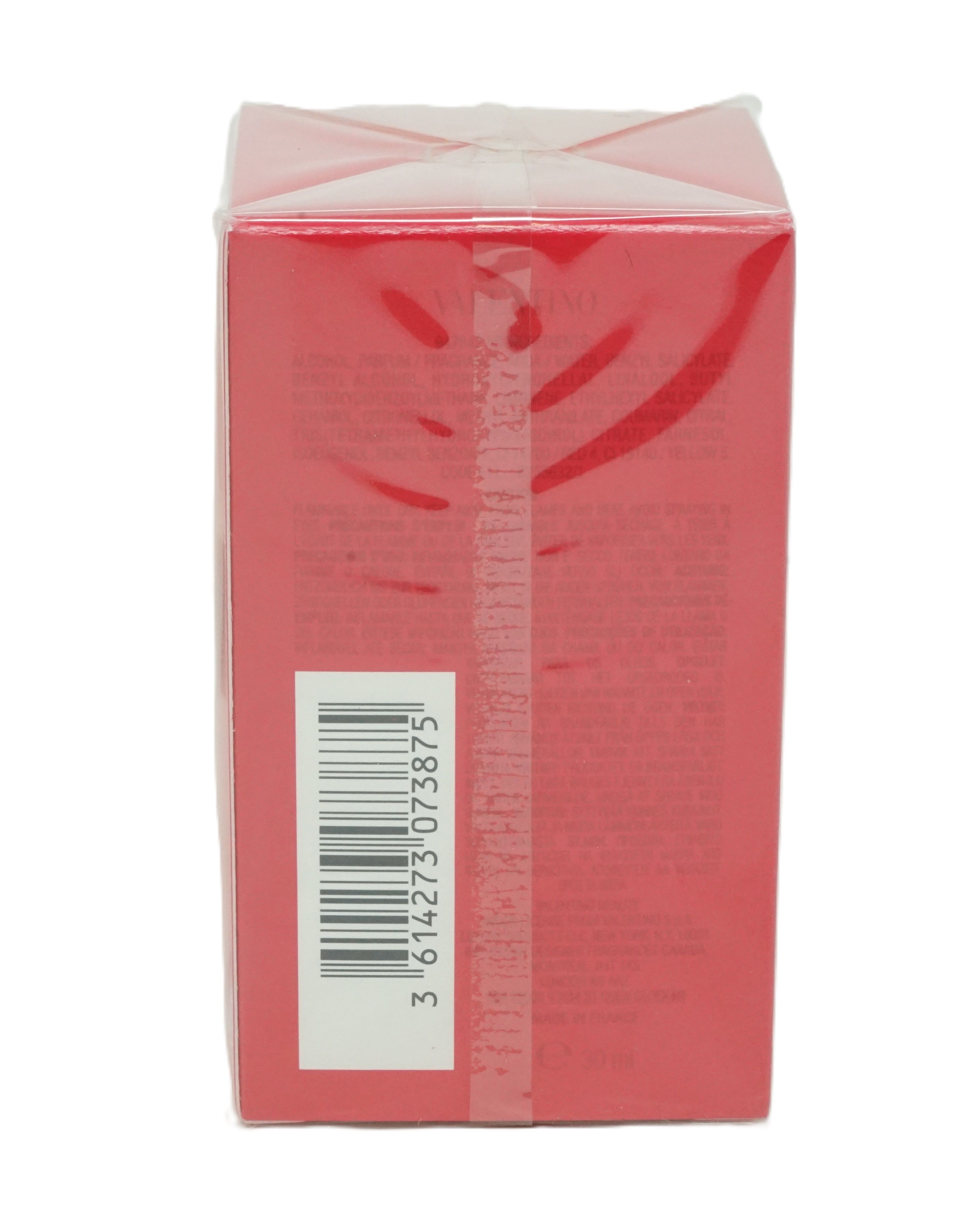 Confezione rossa con codice a barre. Testo sulla confezione.