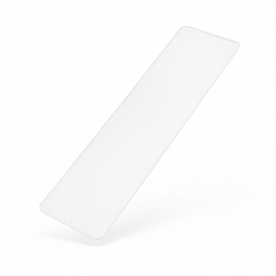 Cerotto in silicone trasparente rettangolare. Superficie leggermente a coste. Angoli arrotondati. Su sfondo bianco.