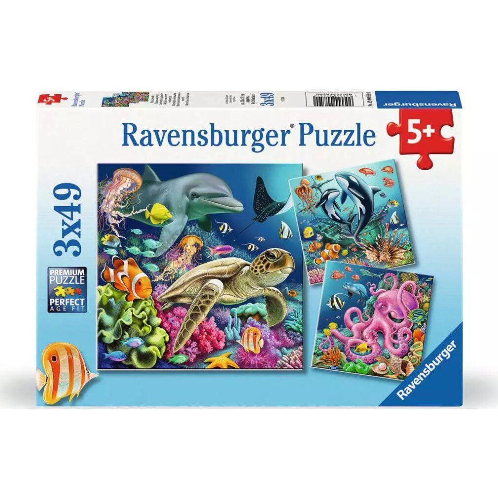 Confezione puzzle Ravensburger. Contiene tre puzzle a tema sottomarino. Stampa: 3x49 pezzi, età consigliata 5+.