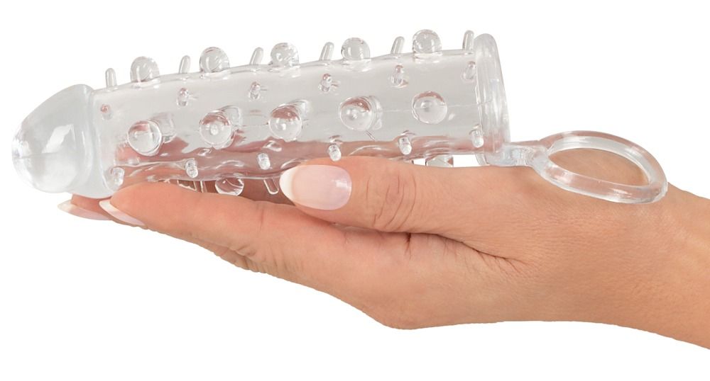 Anello per pene trasparente con borchie e anello per il dito.