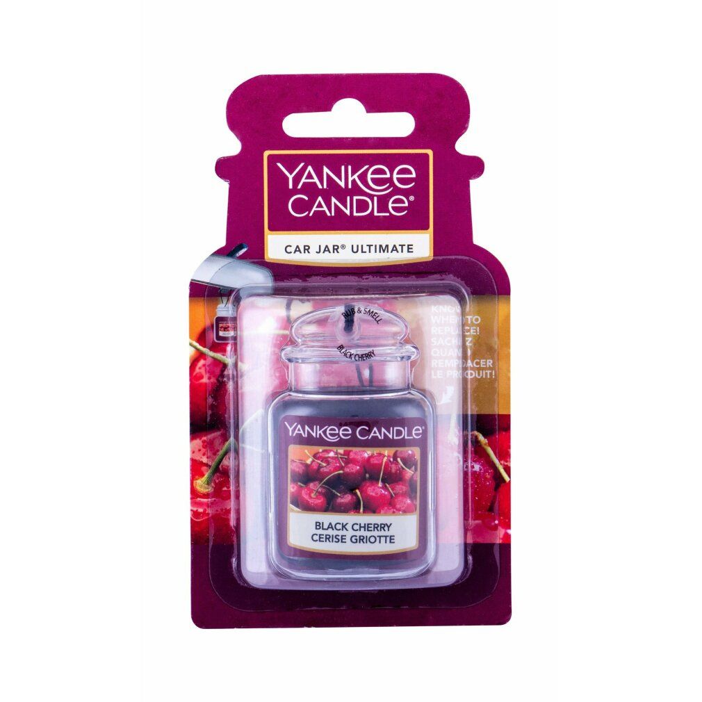 Deodorante per auto Yankee Candle. Profumo ciliegia nera. Confezione. Contenitore in vetro con tappo metallico. Scritta: "CAR JAR".
