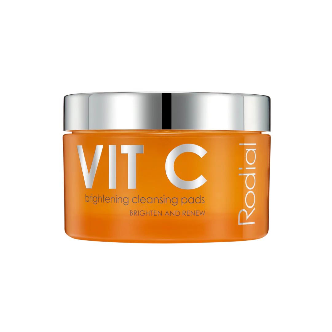 Barattolo arancione con coperchio argentato. Scritta: VIT C, brightening cleansing pads, Rodial. Testo: BRIGHTEN AND RENEW.