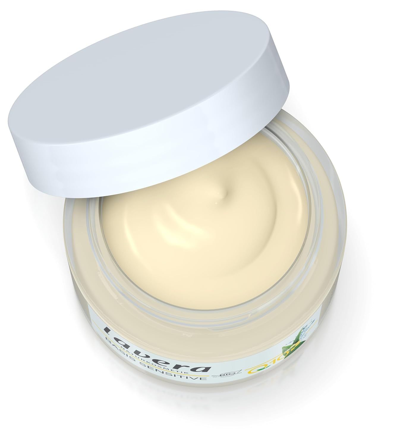 Crema in vasetto con coperchio aperto. L'etichetta riporta "lavera".