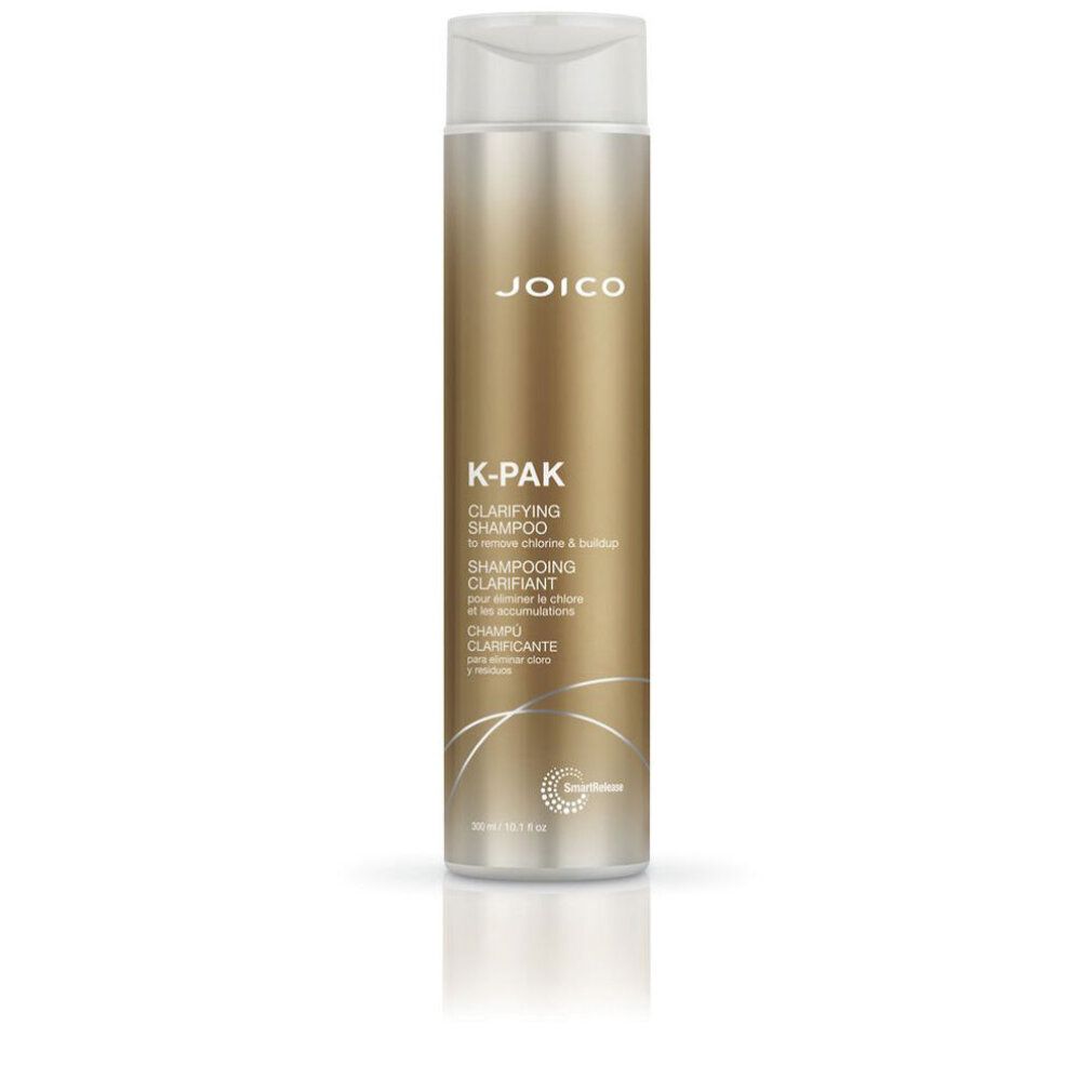 Flacone dorato con tappo bianco. Scritta: Joico, K-Pak Clarifying Shampoo. Nome del prodotto e logo.