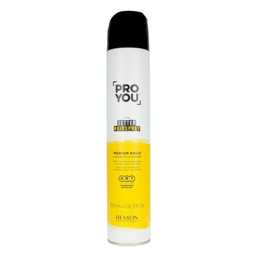 Bomboletta spray per capelli. Bianco, giallo e nero. Scritta: PRO YOU, SETTER HAIRSPRAY, MEDIUM HOLD. Marca: Revlon.