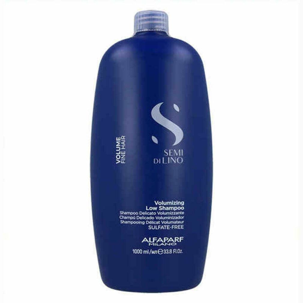Flacone di shampoo blu con tappo bianco. Testo: Semi Di Lino, Volume Fine Hair, Volumizing Low Shampoo, Alfaparf Milano. 1000 ml.