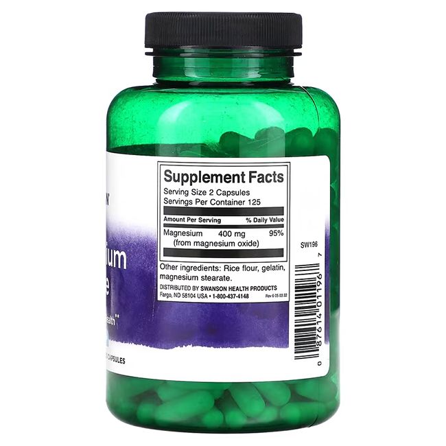 Flacone verde con etichetta. Contiene capsule. Scritta: Supplement Facts. Magnesio 400 mg. Swanson Health Products.
