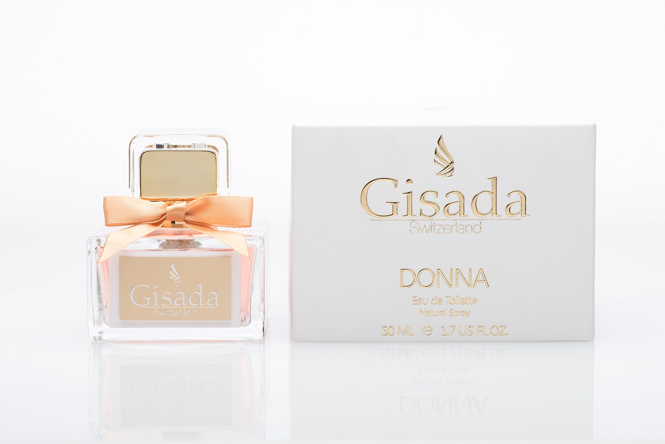 Flacone in vetro con tappo e fiocco dorati, accanto a confezione bianca. Logo e scritta Gisada Donna.