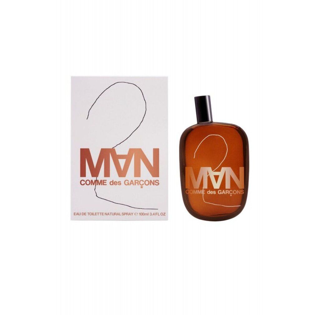 CDG 2 MAN Eau de Toilette Spray. Flacone e confezione. Liquido marrone, tappo nero. Scatola bianca.