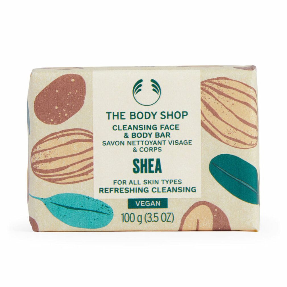 Sapone confezionato. Scritta: The Body Shop, Cleansing Face & Body Bar, Shea, Vegan. 100 g.