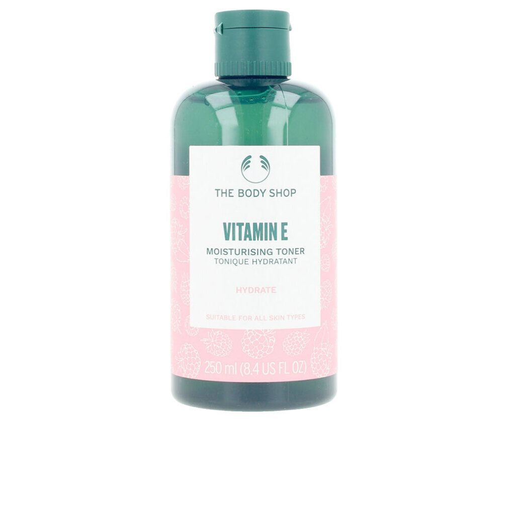 Flacone verde con etichetta rosa. Scritta: Vitamin E, Moisturising Toner, Hydrate. Marchio: The Body Shop. Adatto a tutti i tipi di pelle.
