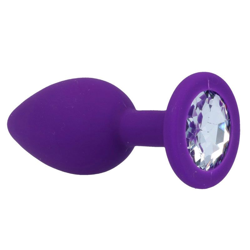 Plug anale viola in silicone con cristallo sulla flangia, vista laterale.