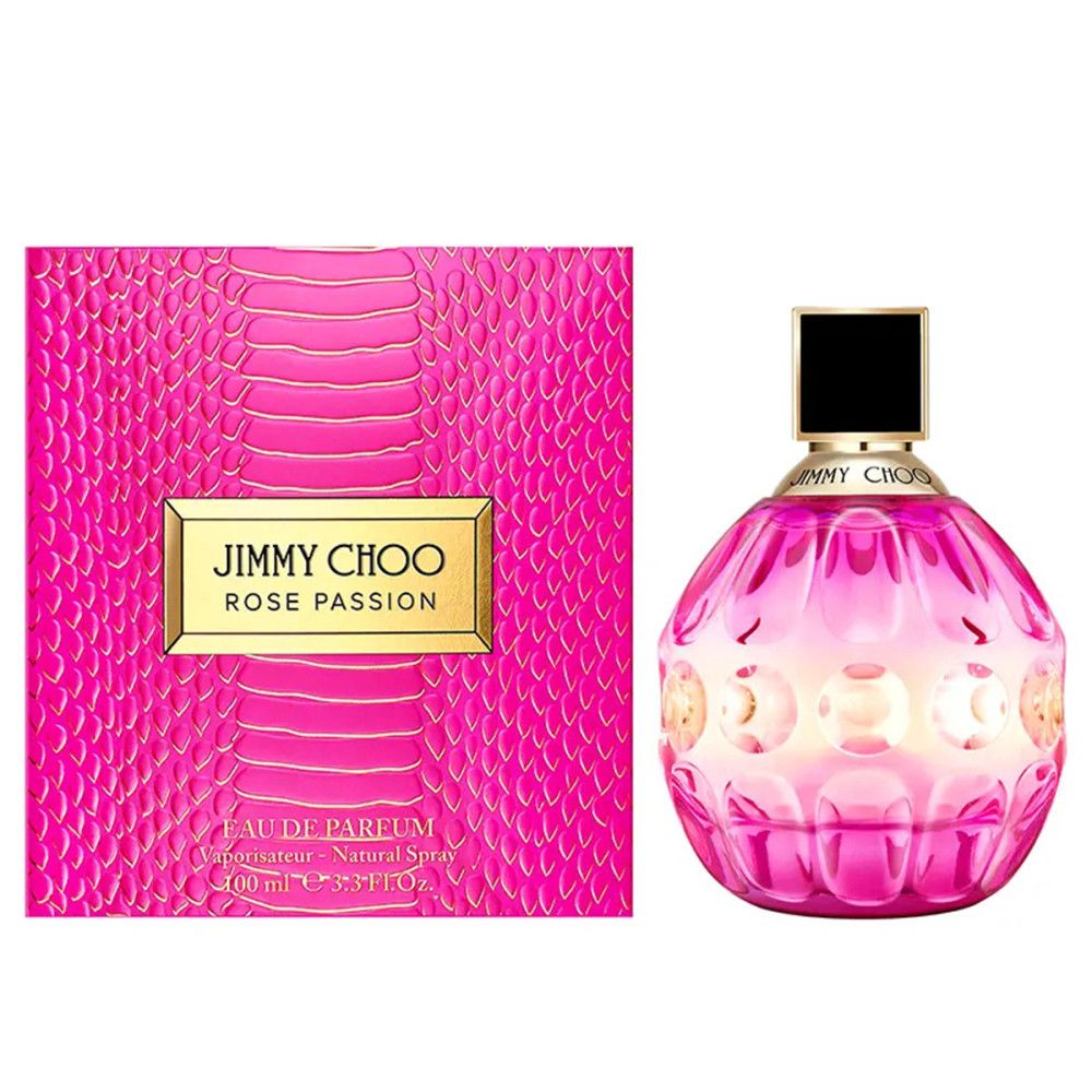 Flacone rosa con tappo nero e scritta dorata. Scatola rosa con scritta dorata accanto.