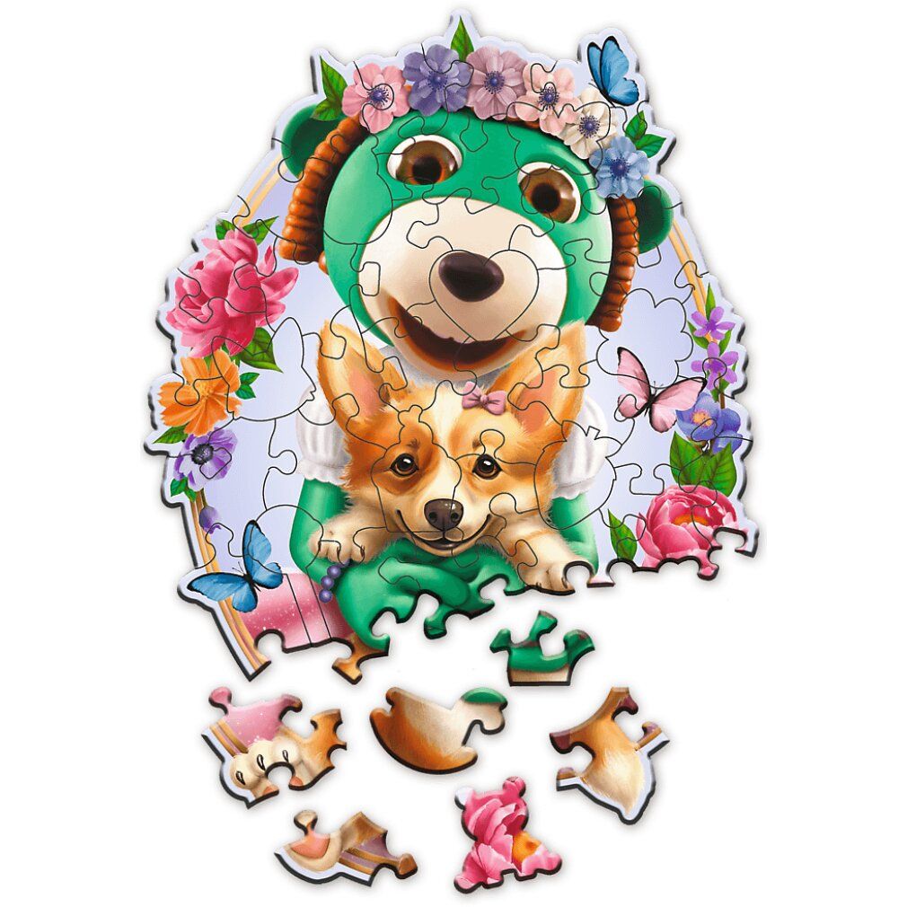 Puzzle in legno con orso e cane. Alcuni pezzi del puzzle sono accanto. Sono raffigurate fiori e farfalle.