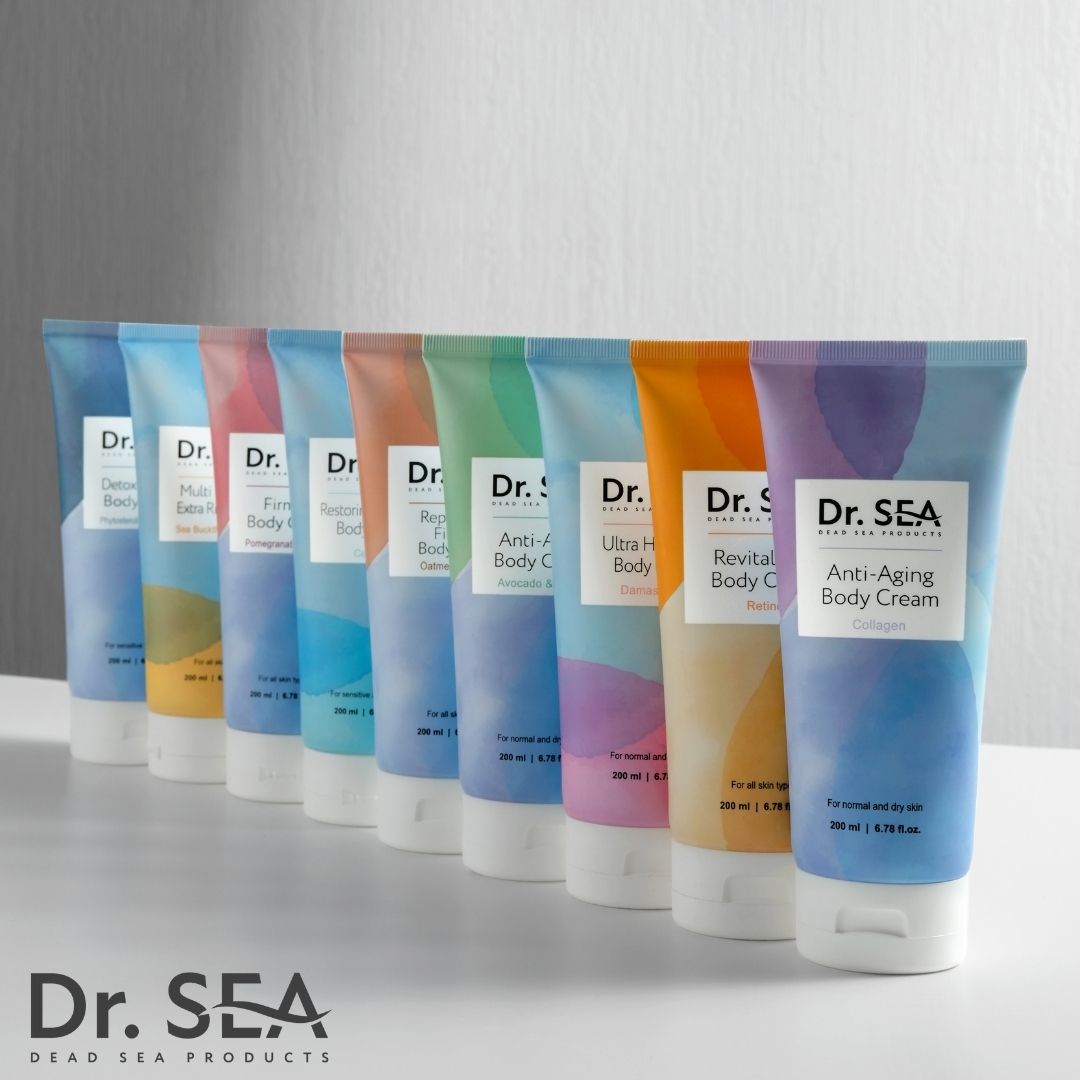 Fila di tubi di crema. Scritta: Dr. SEA. Diversi nomi di prodotti e colori.